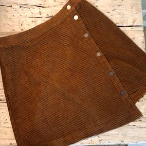 Camel button above knee skirt